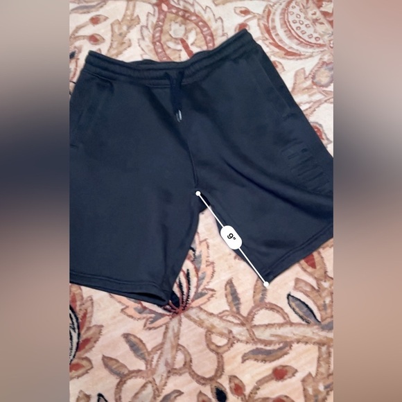 Puma black sweatpants shorts with front pockets, size medium - Picture 4 of 8